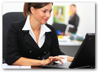 Woman studying online at computer