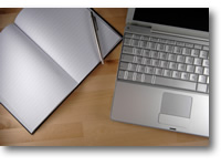 Laptop and notepad
