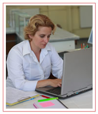 AmeriTech College student at computer