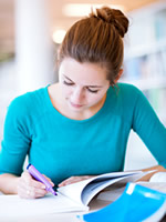 Female student reading - Liberty University