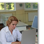 Woman studies at desk