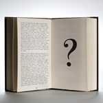 Question mark on the page of an open book