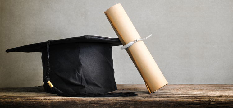 cap and gown; Online Accelerated Bachelors to Masters Program