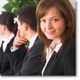 Woman smiling with coworkers