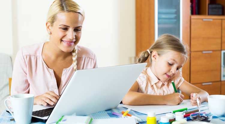 mom and child both doing homework